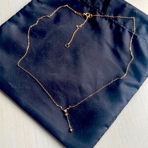 Catbird 14k gold Lariat Necklace w/three small diamonds.